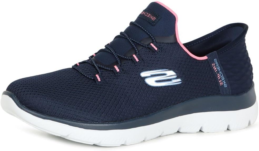 Pavo Monitor Arm installed on a wooden desk showing adjustable positions